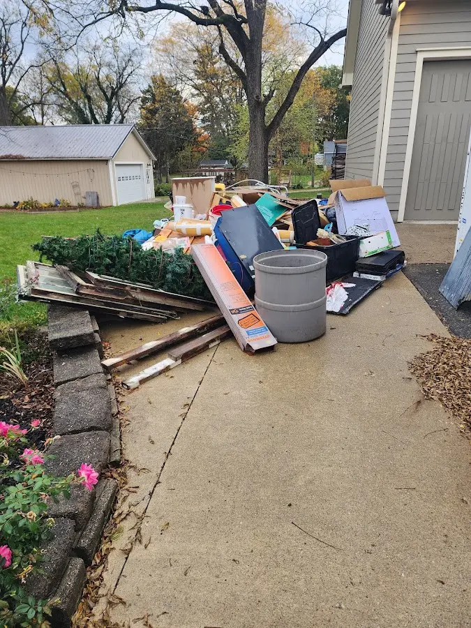 Dumpster being loaded with debris for 30 Yard Dumpster Rental in Walnut Creek